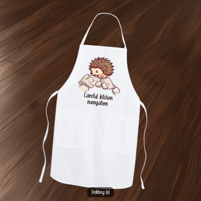 Funny apron with a determined hedgehog carefully navigating over rocky terrain, ideal for cooking or messy activities.