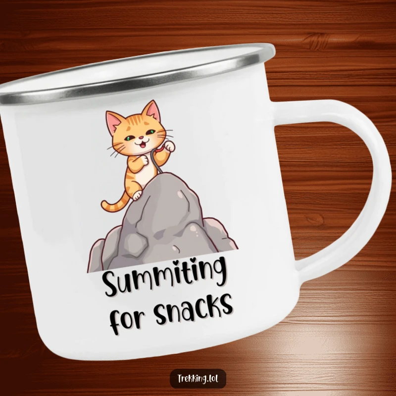 Funny enamel camping mug showing a determined cat using a tiny grappling hook to scale a rock, for outdoor use.