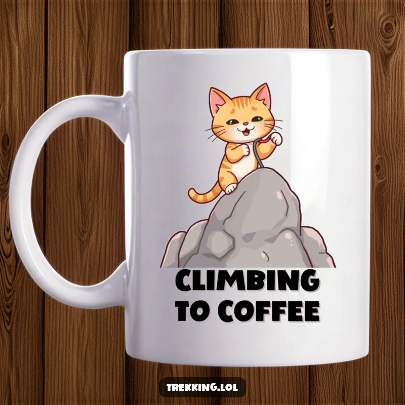 Funny mug showing a focused cat using a tiny grappling hook to scale a small rock face with determination.