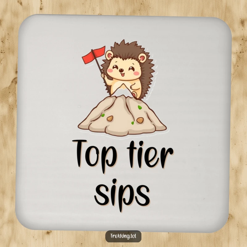 Funny drink coaster with a happy hedgehog planting a flag on a miniature mountain peak, adding humorous table protection.