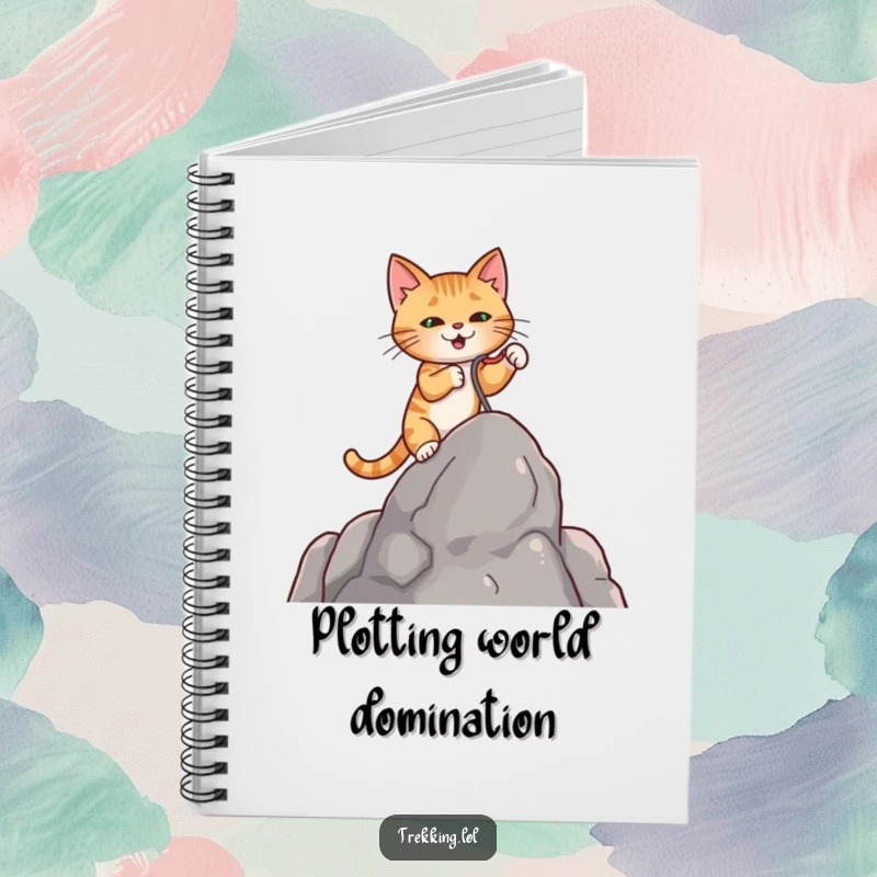 Funny notebook featuring a determined cat using a miniature grappling hook to climb a rock, ideal for planning.