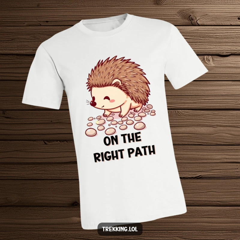 Funny t-shirt showcasing a content hedgehog meticulously navigating a path adorned with glittering pebbles, looking delightful.