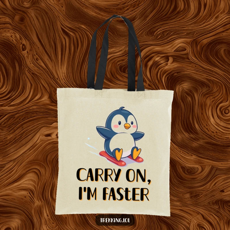 Funny tote bag featuring a happy penguin sliding down a snow-covered slope, radiating excitement and a love for winter sports.