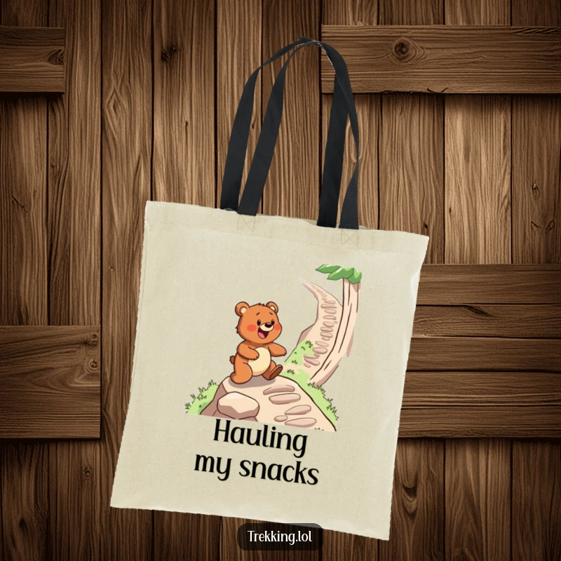 Funny tote bag showcasing a determined bear navigating a steep, winding hiking path, ideal for outdoor enthusiasts.