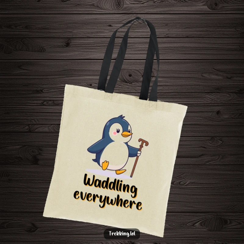 Funny penguin waddling with a walking stick, printed on a sturdy tote bag, great for shopping.